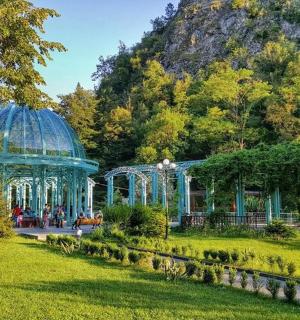 a gazebo and a pavilion in a park