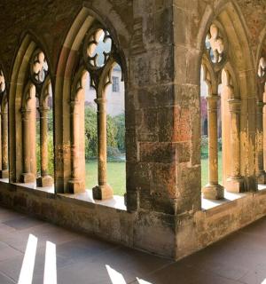 a building with a row of arches and windows