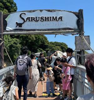 a group of people standing on a bridge