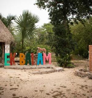 a sign that says bash in front of a playground