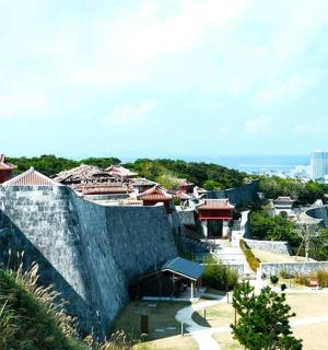 a view of a building with a city in the background