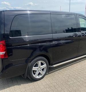 a black van parked in a parking lot