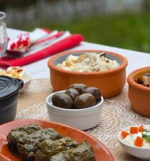 a table with bowls of food on a table