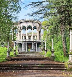 a large building with stairs in front of it