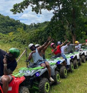 a group of people riding on wheelers