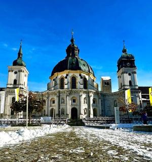 a large building with two domes on top of it
