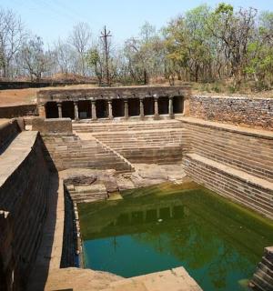 a large pool of water in a brick wall