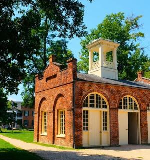 a brick building with a clock tower on top