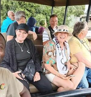 a group of people sitting on a bus