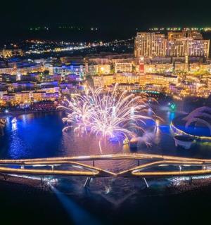 a view of a city with fireworks at night