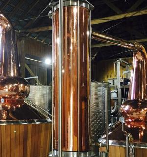 a couple of bottles of wine in a brewery