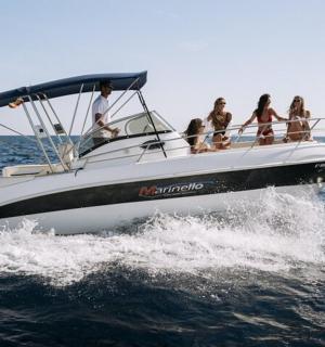 a group of people on a boat in the water