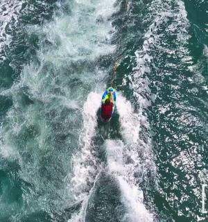 a boat in the water with a person in it