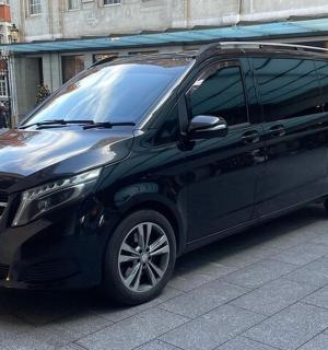 a black van parked on a city street
