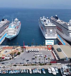 three cruise ships are docked in a harbor