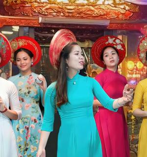 a group of women standing next to each other