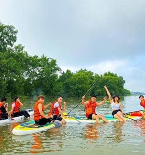 a group of people on kayaks in the water