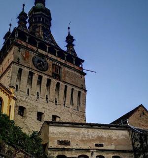 a tall building with a clock tower on top of it