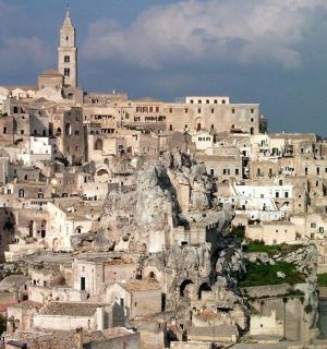 a group of buildings on top of a mountain