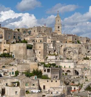 a group of buildings on top of a mountain