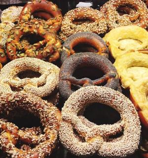 a display of different kinds of donuts on a table