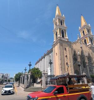 a truck is parked in front of a church