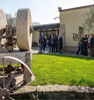 a group of people standing in front of a building