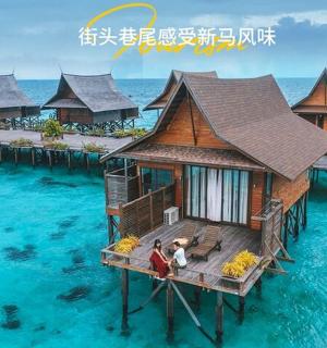 a house on the water in the middle of the ocean