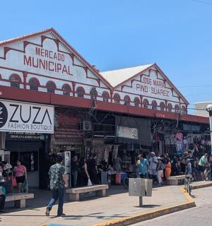 a group of people standing outside of a building