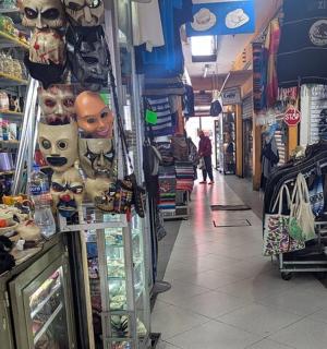 a store aisle of a store with items on display