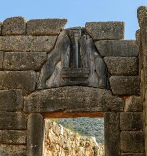 a stone archway in a stone wall