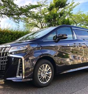 a blue suv parked in a parking lot