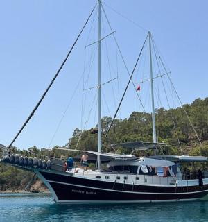 a large boat in the water on a lake