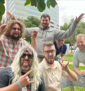 a group of people posing for a picture