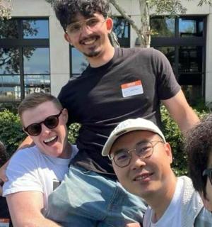 a group of people posing for a picture