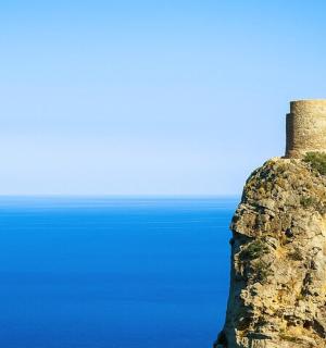 a rock with a chimney on top of it