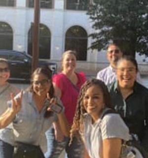 a group of people posing for a picture