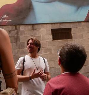 a man talking to a group of people