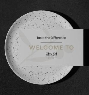 a plate with a welcome card on a table