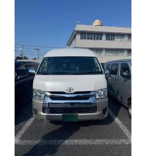 a white van parked in a parking lot