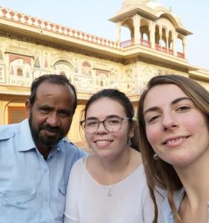 a group of people standing in front of a building