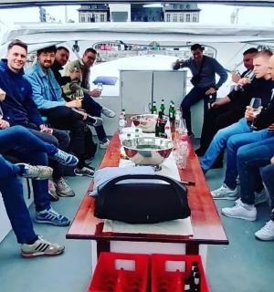 a group of people sitting in the back of a van