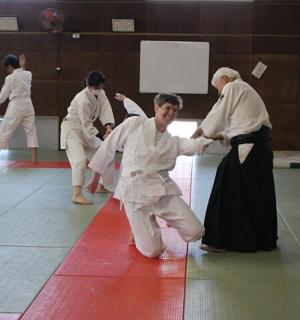 a group of people dancing on a dance floor
