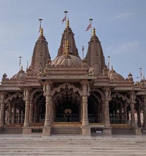 a large stone building with towers on top