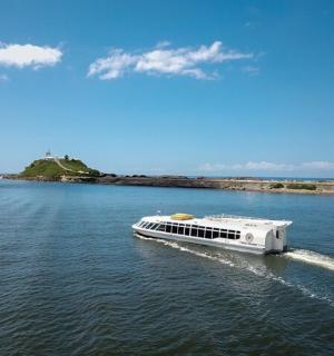 a white boat on a large body of water