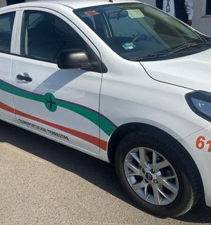 a white car with a green line painted on it