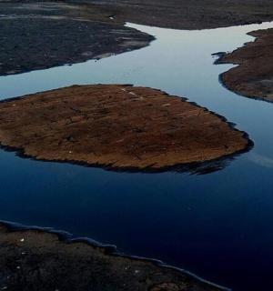 an island in the middle of a body of water