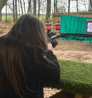 a woman is taking a picture with a camera
