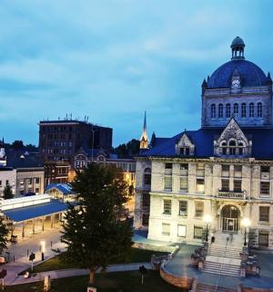 a view of a building in a city at night