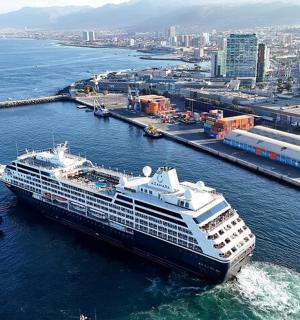 a cruise ship is docked in a harbor